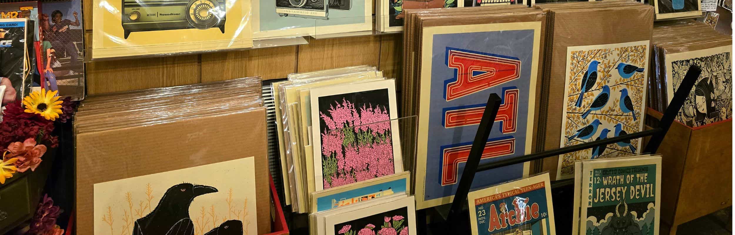 HomeGrown Decatur display of various Methane Studio art prints