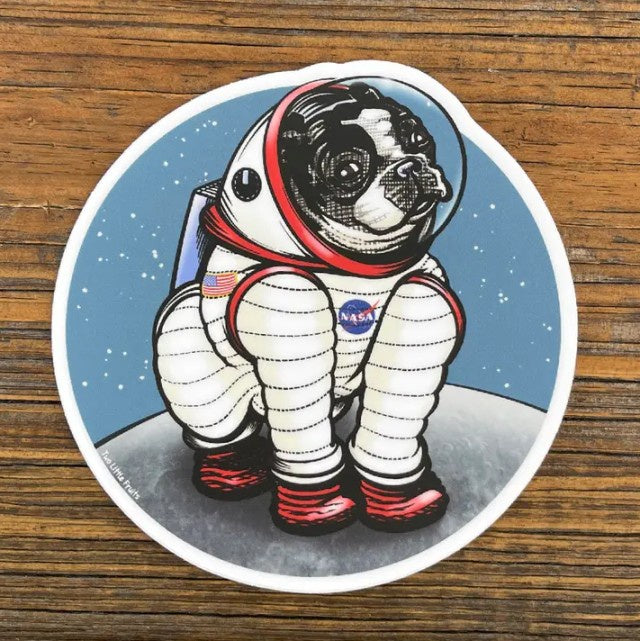 Sticker of a Boston terrier in a NASA spacesuit sitting on the moon