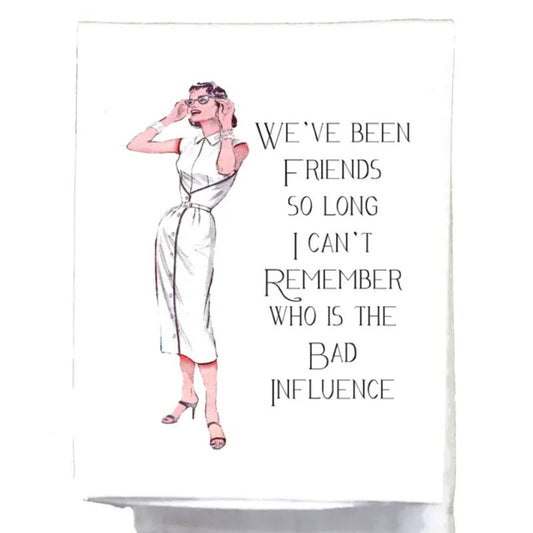 Kitchen towel with a retro image of a woman in a white dress and text that reads "We've been friends so long I can't remember who is the bad influence"