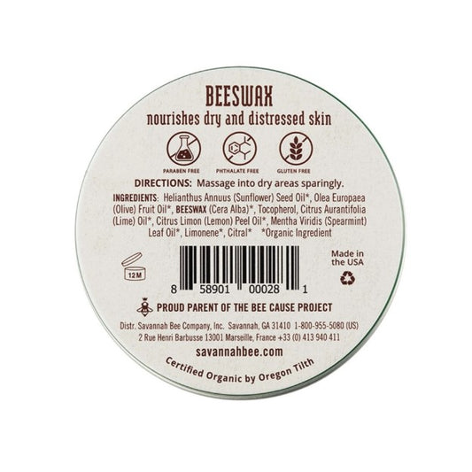 The back of a .75 ounce tin of nourishing beeswax salve