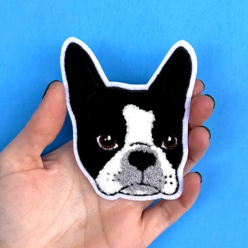 Iron on fabric patch in the shape of a black and white Boston Terrier's face