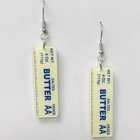 Earrings shaped like two dangling sticks of salted butter
