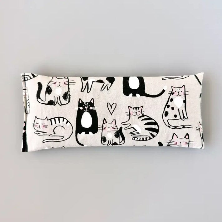 Organic lavender and flaxseed eye pillow in a black and white cute cartoon cat pattern