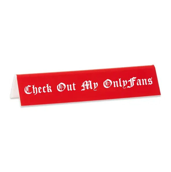 Red desk sign with text that reads "Check Out My OnlyFans"