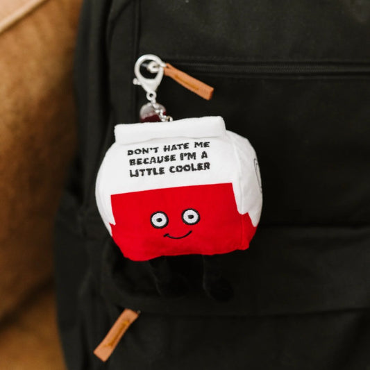 Plush keychain shaped like a red and white water cooler with a smiling face and the words "don't hate me because I'm a little cooler" embroidered on it