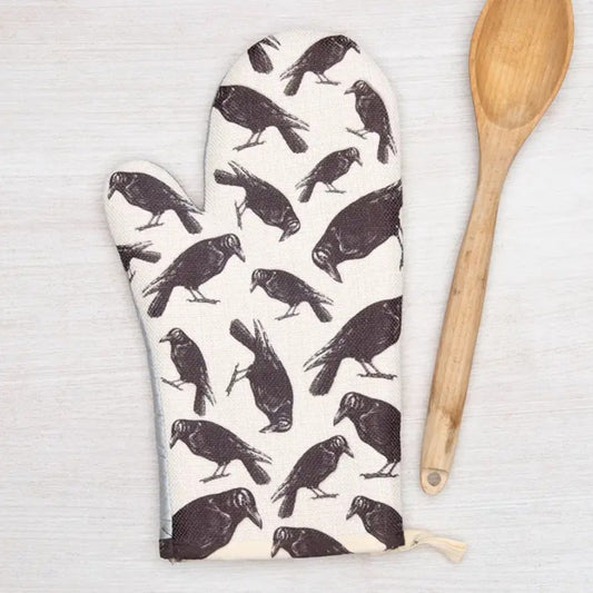 Oven mitt with a crow pattern