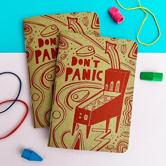 don't panic paper notebook with a pinball machine design art print