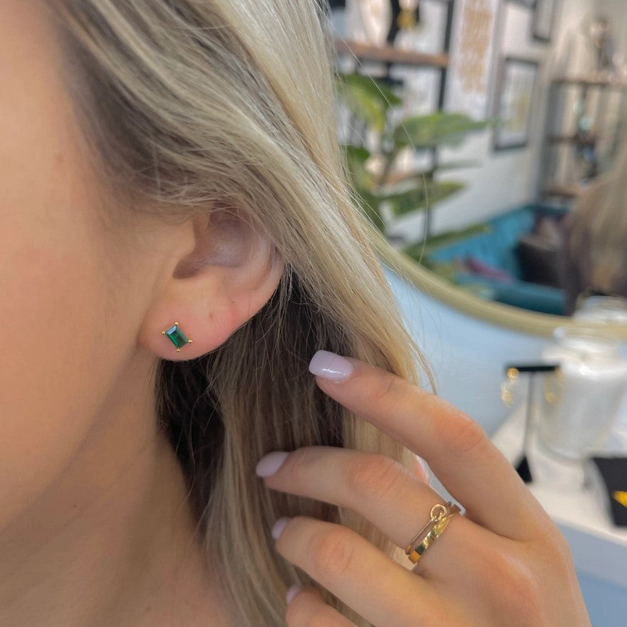 Small emerald colored gemstone stud earrings