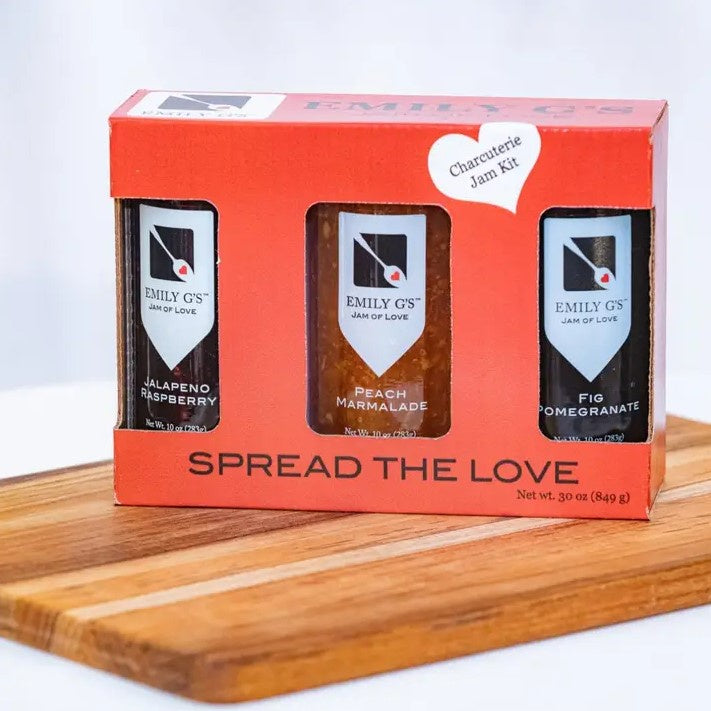 set of three jams: jalapeno raspberry, peach marmalade, and fig pomegranate in one packaged gift box