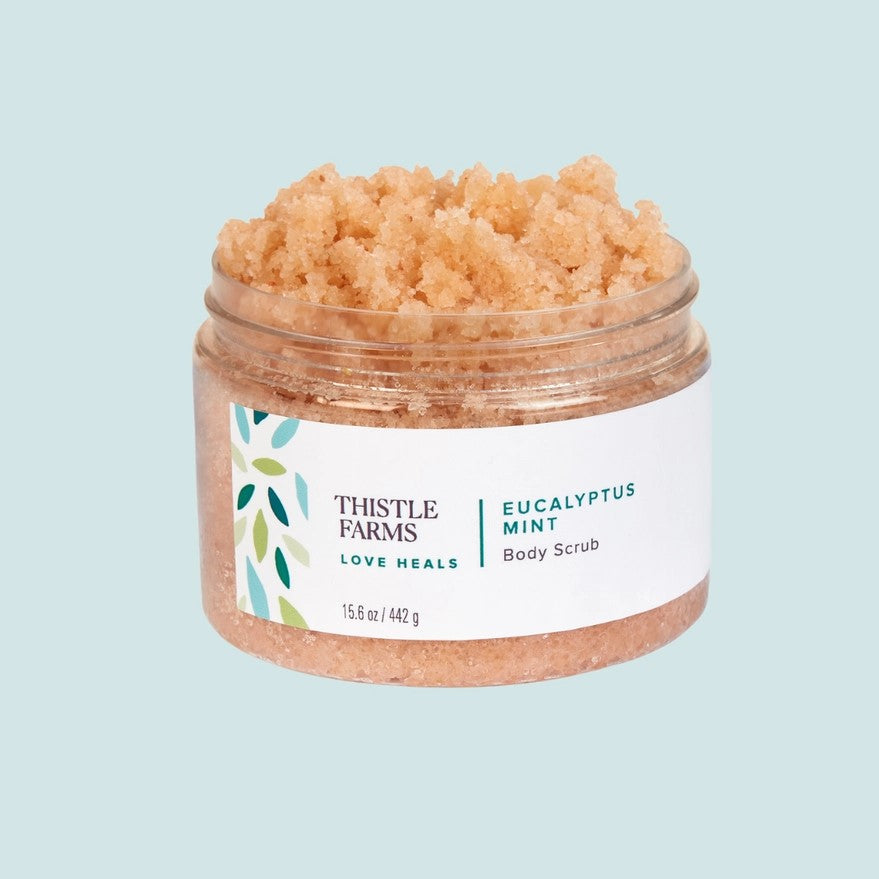 A 15.6 oz jar of eucalyptus mint scented body scrub.
