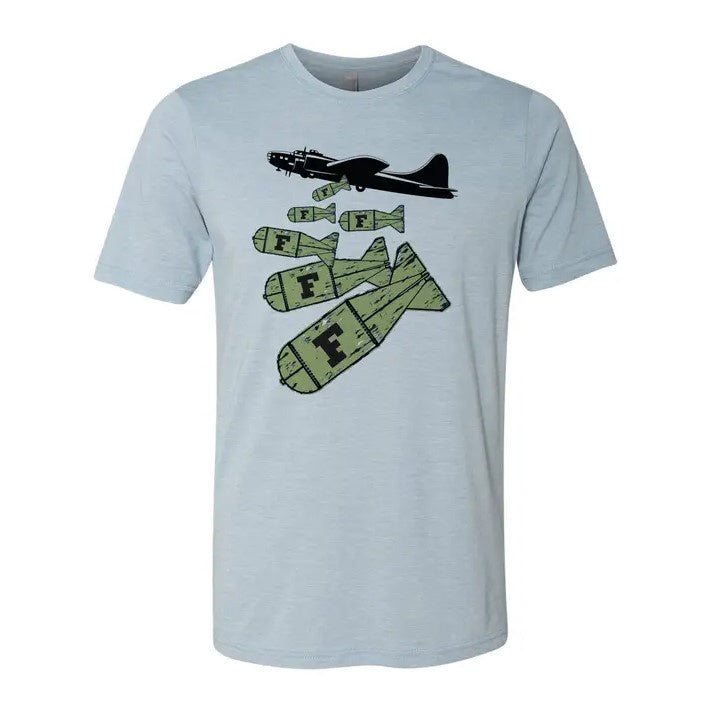 Light blue tee shirt depicting a black jet dropping green bombs with the letter "F" on them
