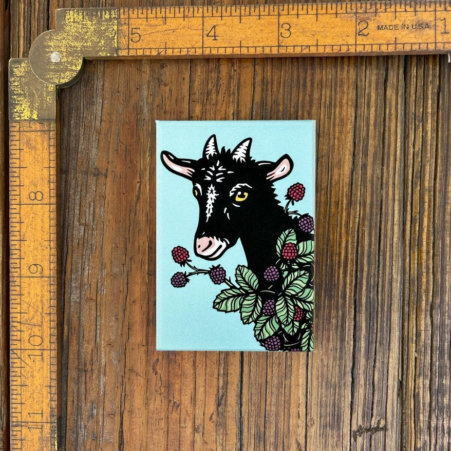 goat eating berries magnet