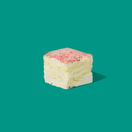 Square marshmallow with a pink raspberry dusting on top
