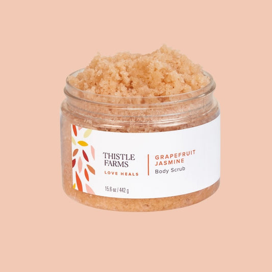 A 15.6 oz jar of grapefruit jasmine scented body scrub.
