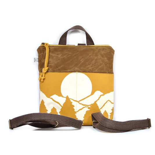 Leather backpack with mountains and sun yellow pattern