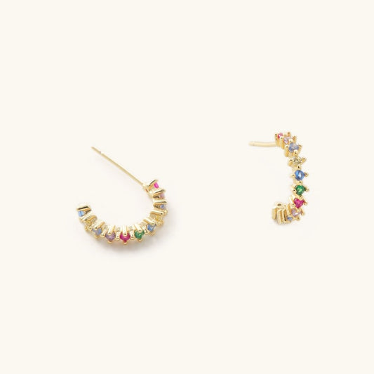 Delicate hoop earrings embedded with rainbow gems
