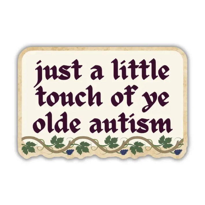 Cream colored vinyl sticker with a grapevine border reading "just a little touch of ye olde autism"