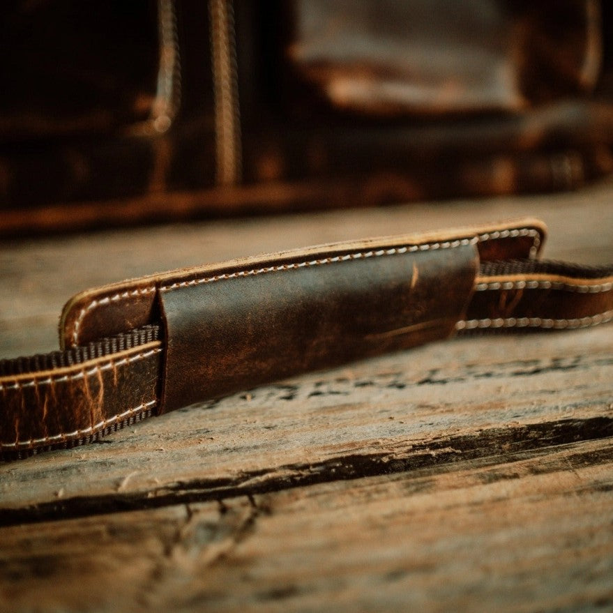 close-up of leather bag strap