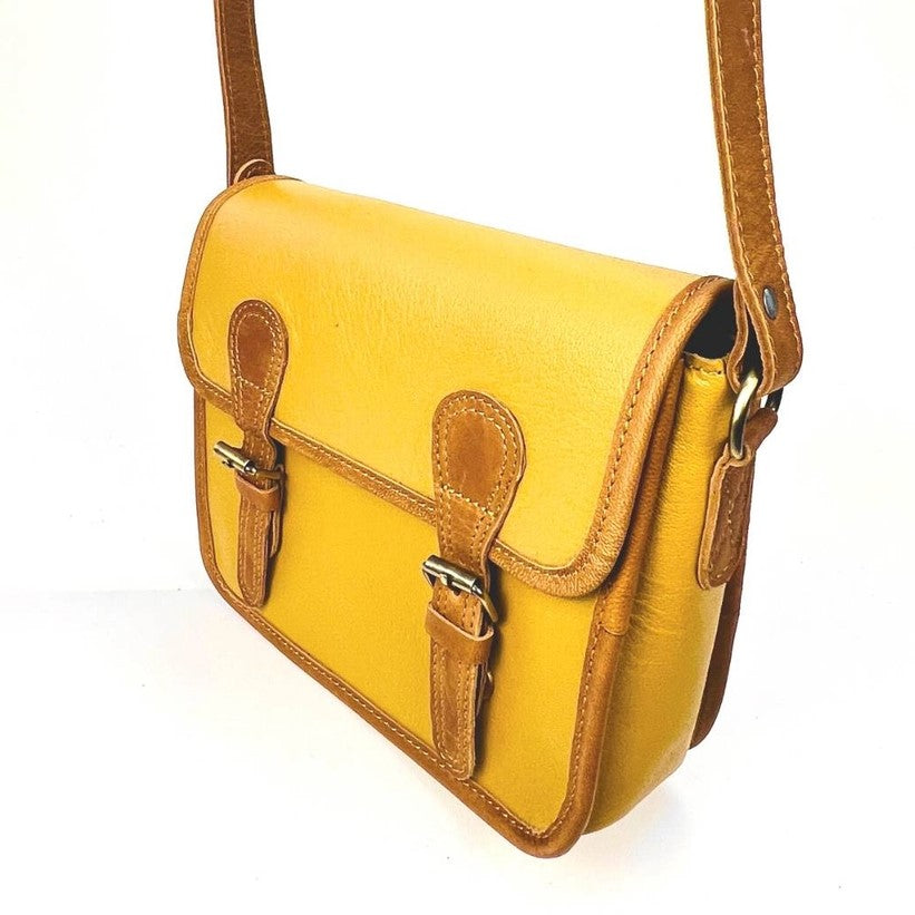 Yellow and Brown Leather Bag with two straps enclosing the bag