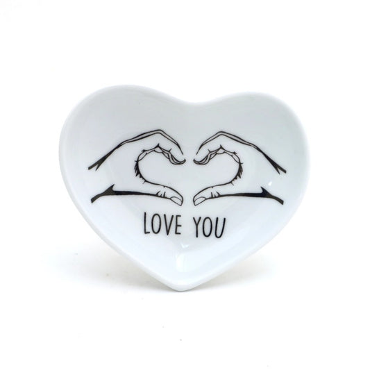 Heart-shaped ceramic dish with an image of two hands making a heart shape and the words "Love you"