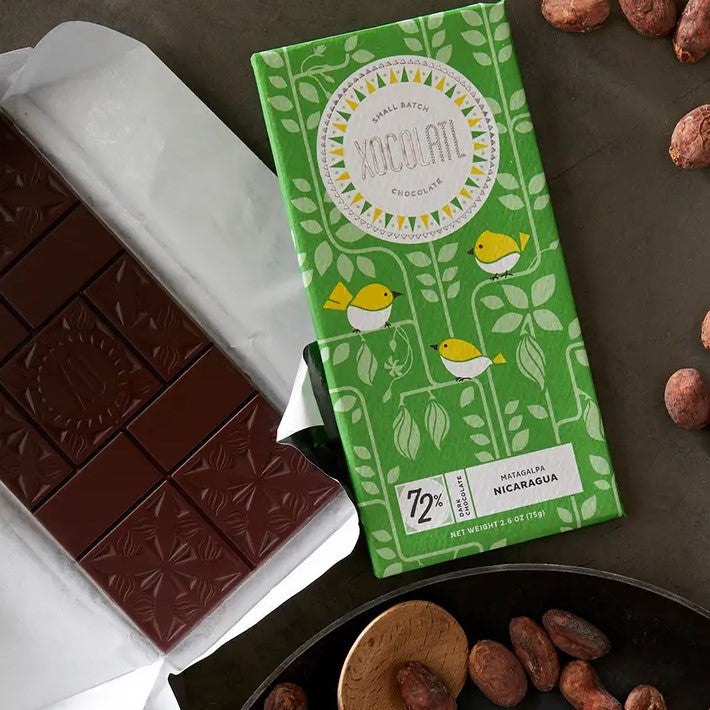 chocolate bar packing with yellow bird and green leaves