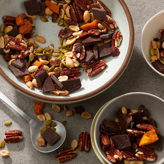 7 ounce bag of trail mix with peanuts, pecans, dark chocolate, peaches, cranberries and pumpkin seeds