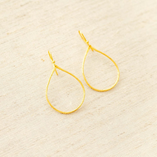 Large gold teardrop shaped dangling earrings