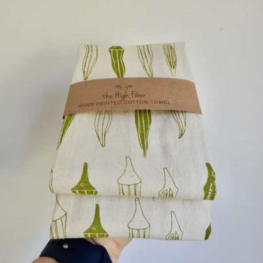 Cotton towel printed with an okra pattern