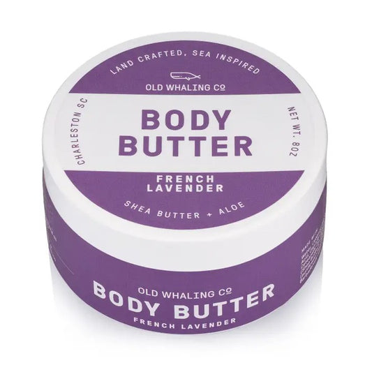 A round tub of french lavender scented body butter with purple and white packaging