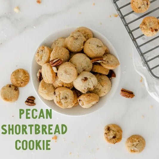 A bowl of small pecan shortbread cookies