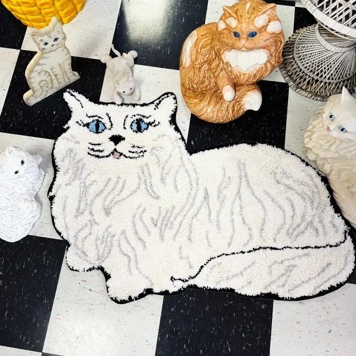 Small white area rug shaped like a Persian cat on a checkered floor