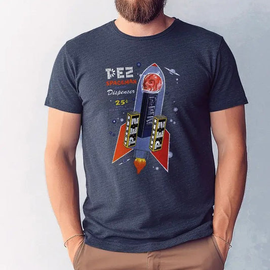 Navy blue t-shirt with a retro illustration of PEZ dispensers in the shape of a rocket and the text "PEZ Spaceman candy dispenser"