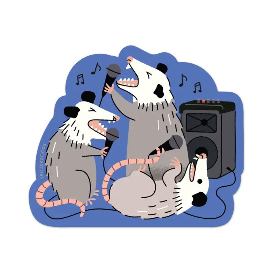 Sticker depicting three possums passionately singing karaoke over a blue background