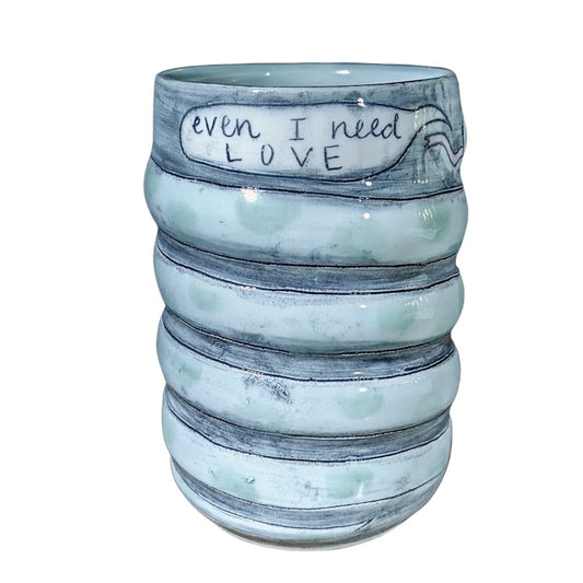 Handmade Tumblr Pottery with a snake and the quote "Even I need love"