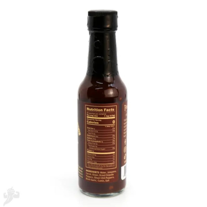 Bottle of hot sauce with nutritional label listing ingredients water, jalapeno, carrot, onion, dried chipotle peppers, ghost chili peppers, black garlic, cumin and salt