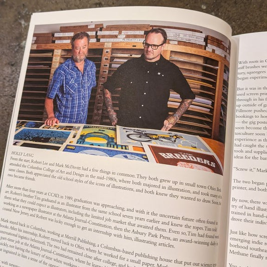 Photograph of Robert Lee and Mark McDevitt inside their book