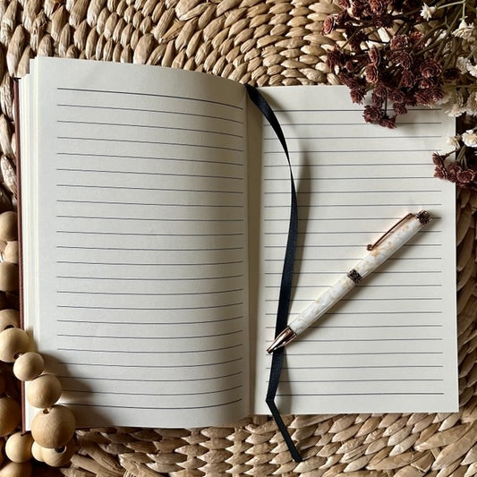 lined journal with ribbon bookmark