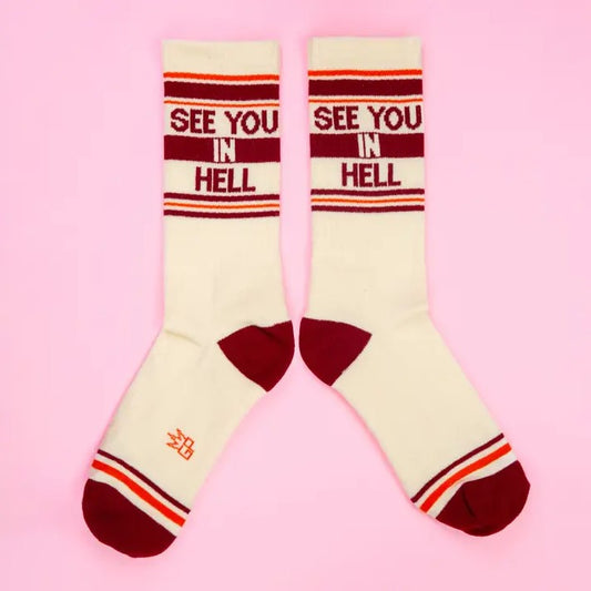 Cream colored calf socks with red and orange stripes and the words "See You in Hell" at the top.