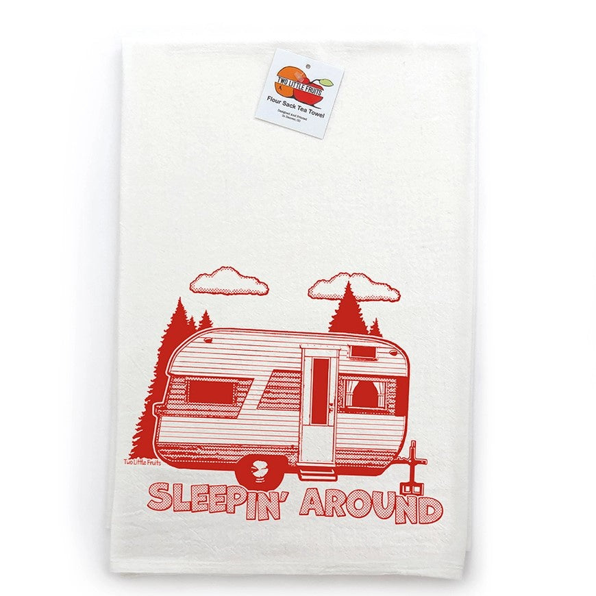 sleepin' around quote on a tea towel with a camper
