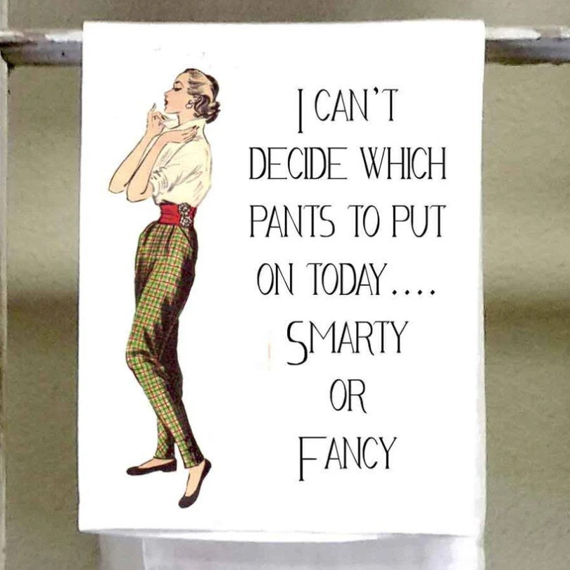 White tea towel with a retro style image of a woman in plaid pants and text that reads "I can't decide which pants to put on today... smarty or fancy"
