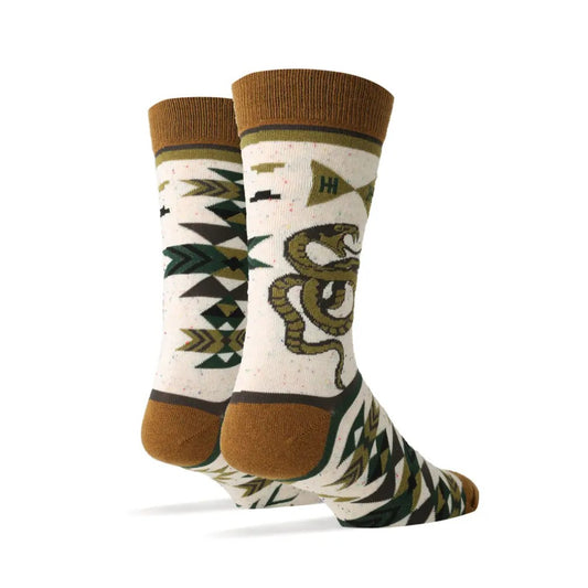 Pair of calf socks with hissing green snakes and a geometric green and white pattern on them