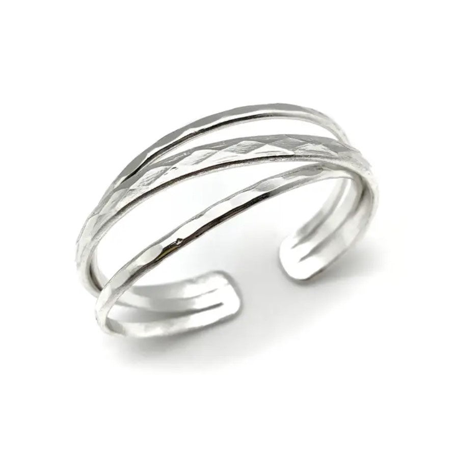 Silver bracelet made of thin stacked bands