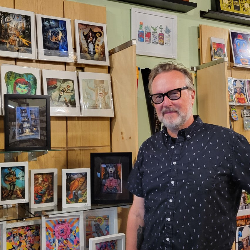 Artist Tim Lee of Rabbit run Studios standing inside store HomeGrown