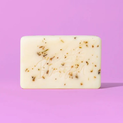 Lavender Soap Bar set against a purple background