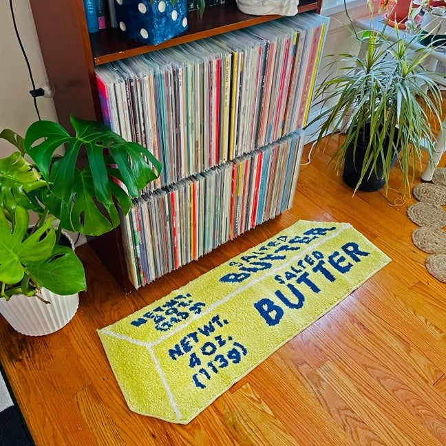 butter Rug on wood floor