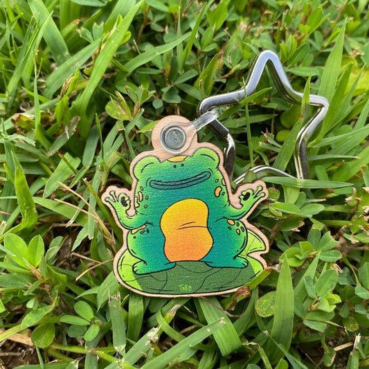 Wood Keychain featuring a frog doing yoga