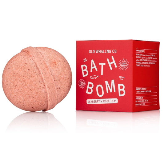 Bath Bomb outside of packaging next to its box