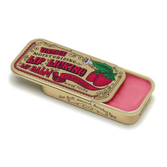 Open lip balm showcasing the strawberry scent