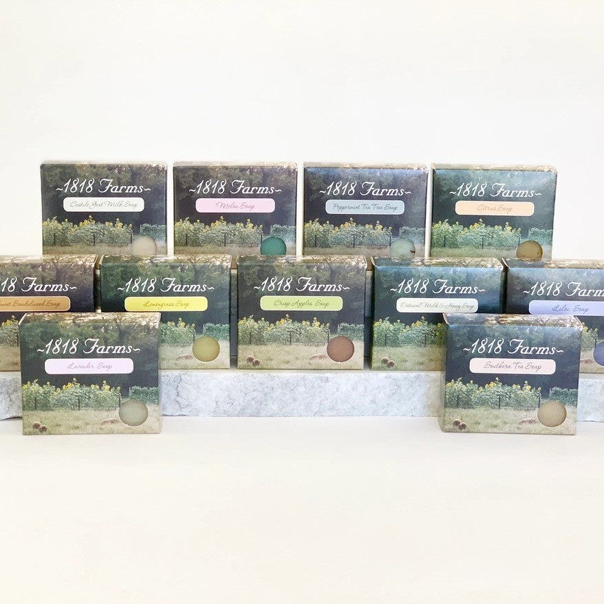 Assorted scents of 4.8 ounce soap with flowery fields on the packaging