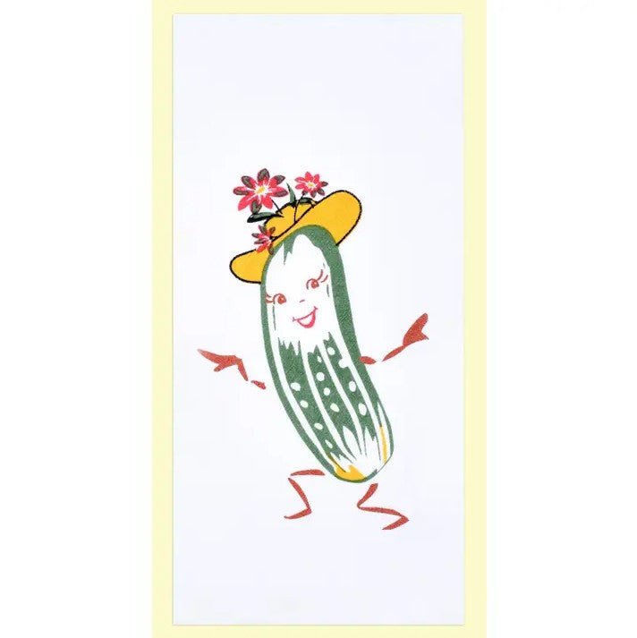 A white dish towel featuring a retro illustration of a smiling pickle with eyelashes and a flowery hat. 